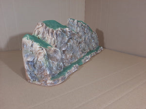 The 885 Sheer Rock Wall is very detailed with sharp rock crevises along with a steep rock wall.